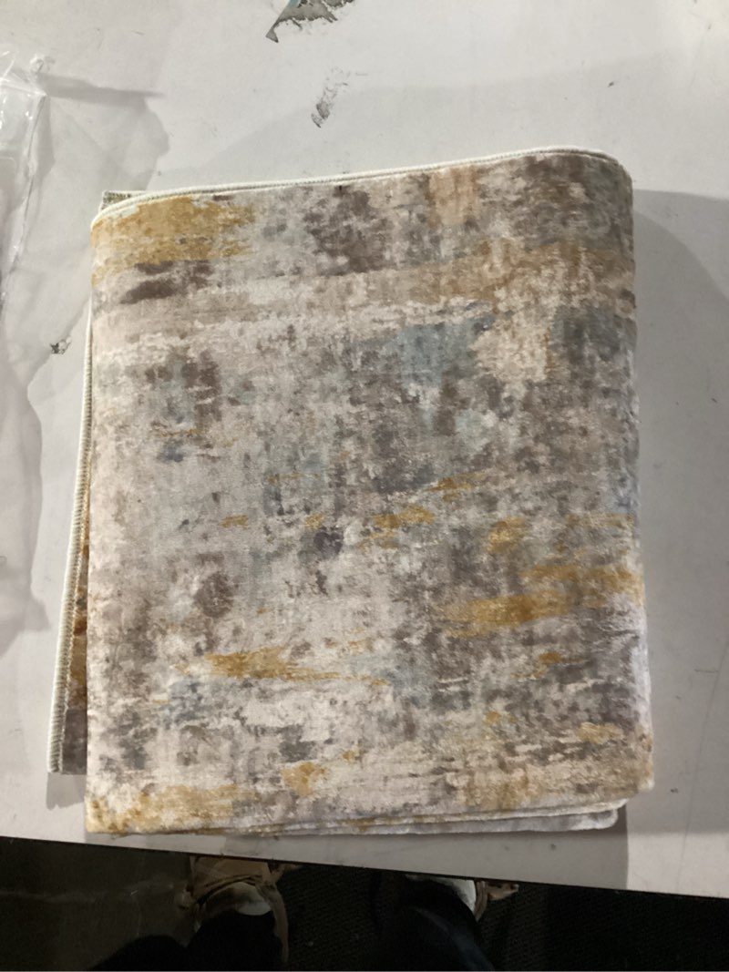 Condition photo showing New/Like New for SAFAVIEH Horizon Shag Collection Area Rug - 5'3" x 7'7", Grey & Gold, Modern Abstract Design, Non-Shedding & Easy Care, 2.6-inch Thick Ideal for High Traffic Areas in Living Room, Bedroom (HZN890D) 5'3" x 7'7" (Rectangular) Grey/Gold