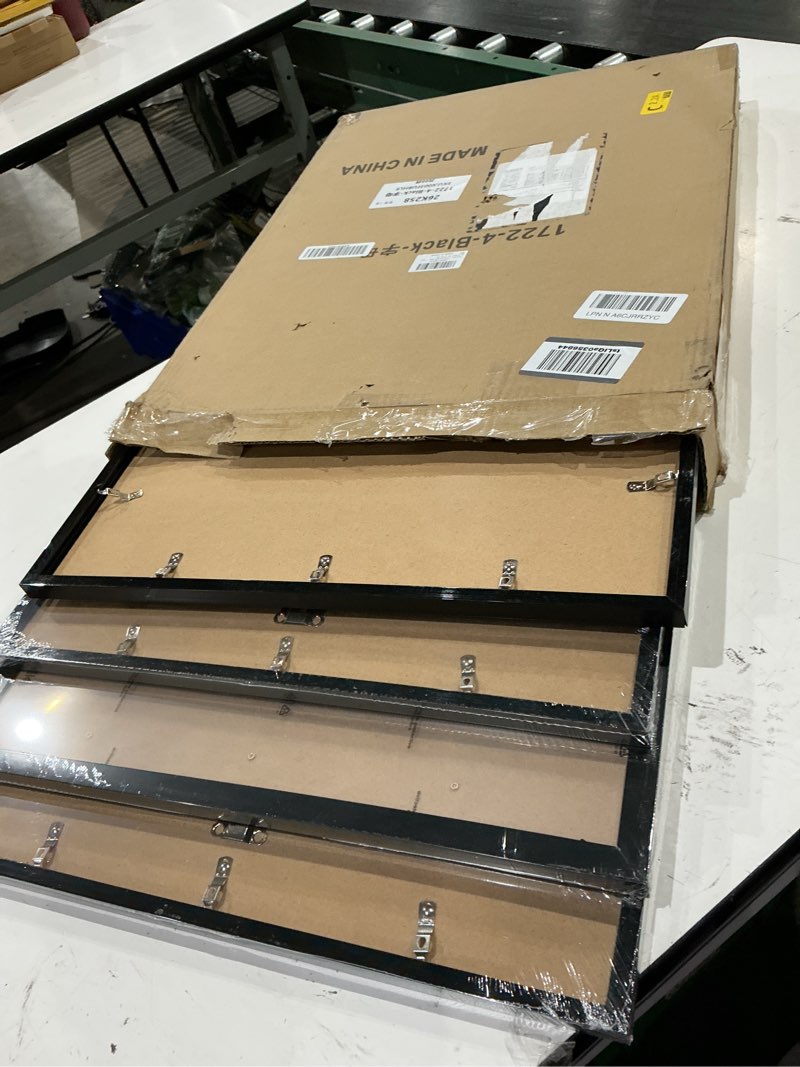Condition photo showing Good Condition for 17x22 picture frame set of 4, black gallery wall frames | lightweight yet sturdy with high-clarity panel, 17 x 22 photo frame for poster & art prints, horizontal vertical mounting black 17x22