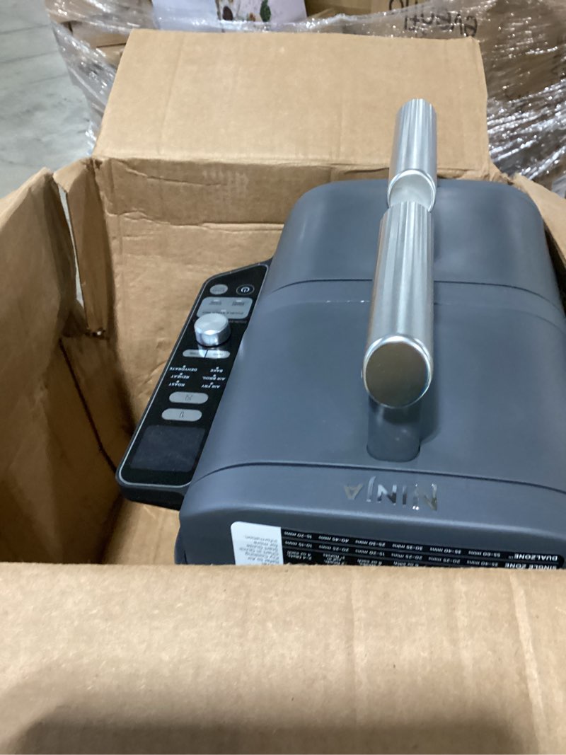 Condition photo showing Good Condition for ninja air fryer, 8 qt doublestack 2-basket, space saving design, cooks 2lb chicken wings, feeds up to 6 people, 6-in1 air fryer, roast, bake & more, easy to clean, dishwasher safe parts, black, sl201