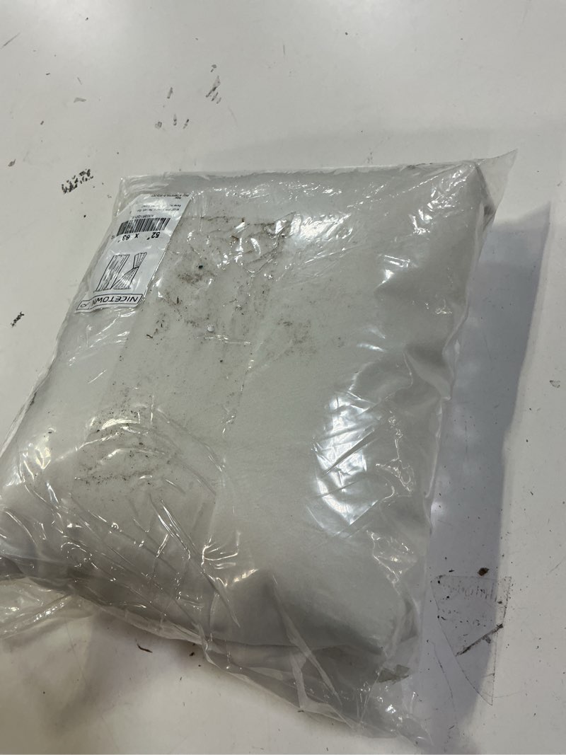 Condition photo showing Good Condition for nicetown luxury velvet curtains 63 inches, sound reducing heavy matt solid rod pocket room darkening drapes/panels for living room (ivory, 2 panels, 63 inches long) ivory white 52"w x 63"l (pack of 2)
