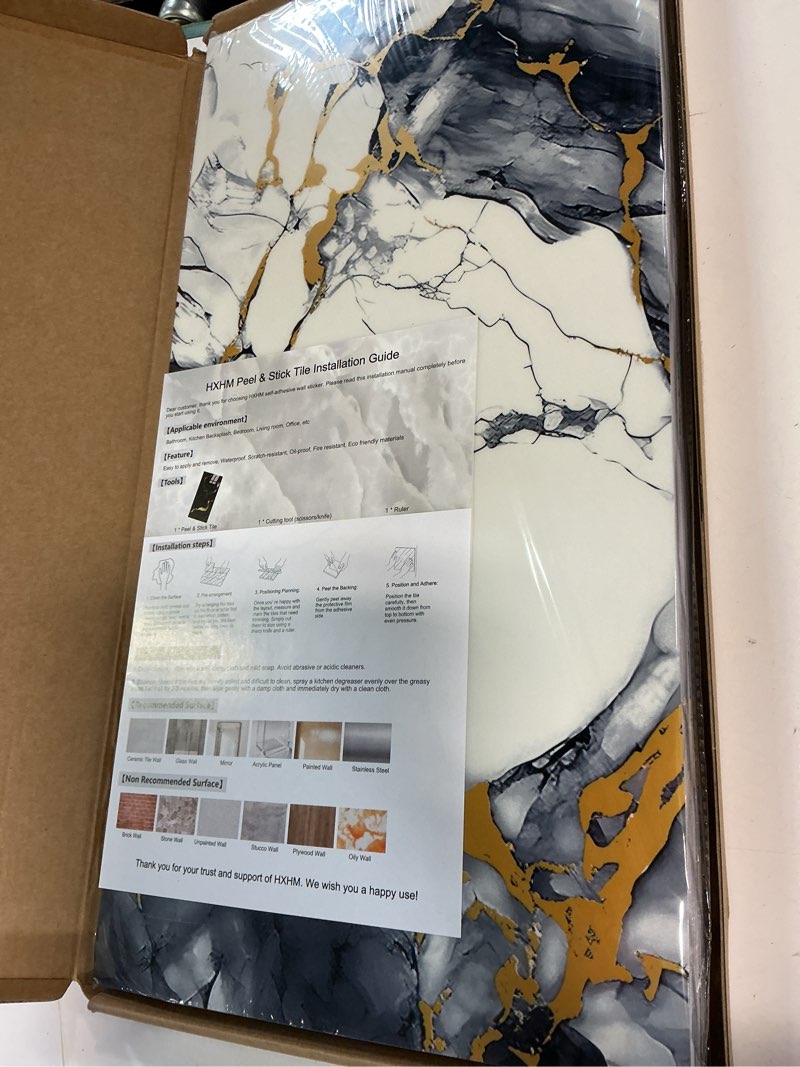 Condition photo showing New/Like New for 12pcs white and black marble peel and stick tiles 23.6"x11.8" waterproof heat resistant self adhesive removable pvc wall panels for kitchen backsplash, bathroom, laundry (not real tile, not for floor) white/black/gold