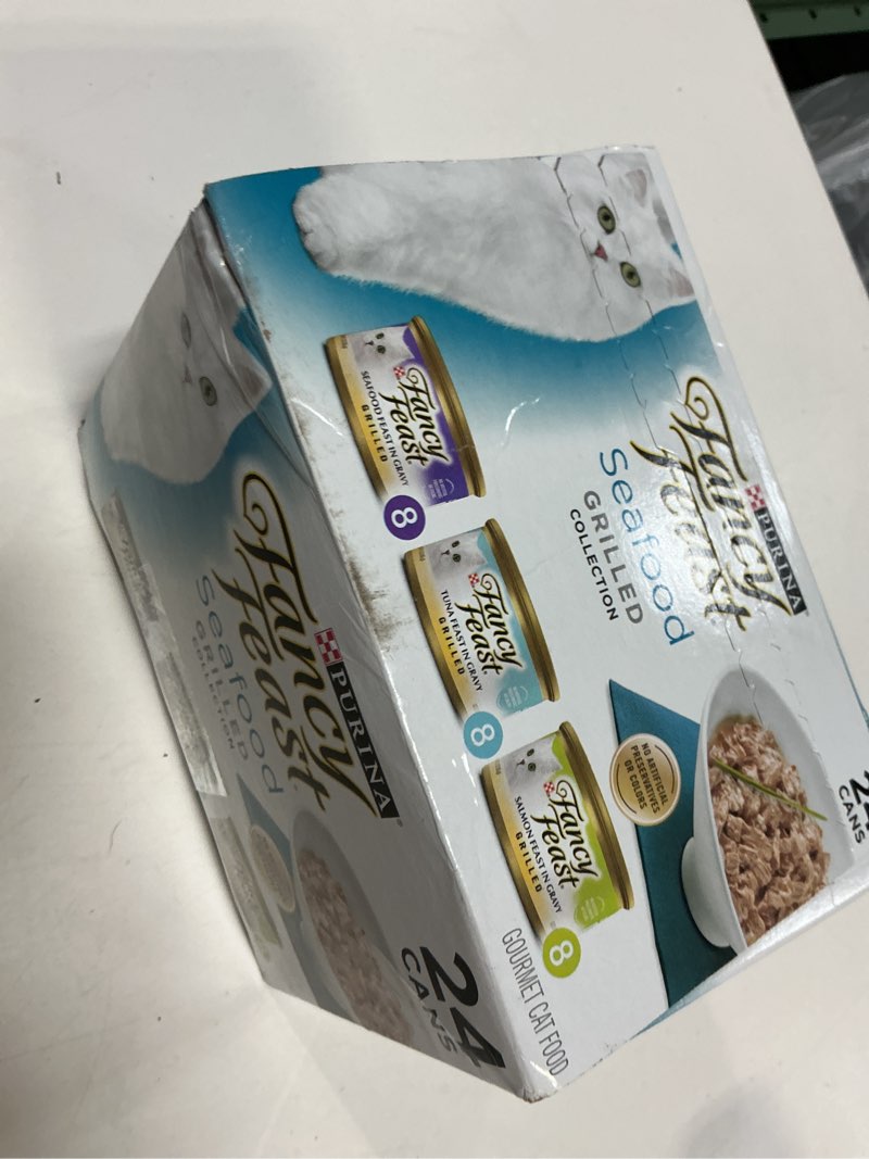 Condition photo showing New/Like New for (bbd 93/2027)  purina fancy feast grilled wet cat food seafood collection in wet cat food variety pack - (pack of 24) 3 oz. cans
