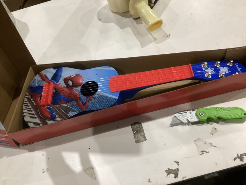Condition photo showing Good Condition for lexibook, spider-man, my first guitar for children, 6 nylon strings, 21" long, guide included, blue/red, k200sp