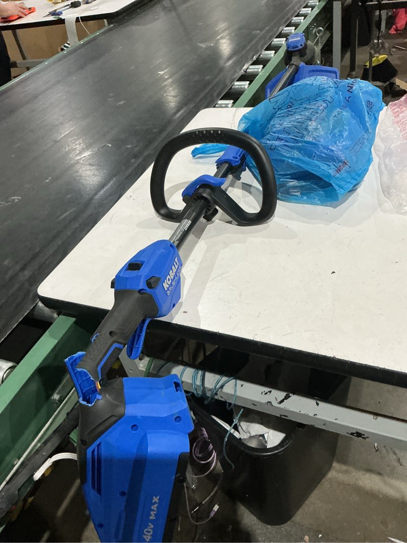 Condition photo showing As Is for kobalt gen4 40-volt 15-in straight shaft battery string trimmer 4.0 ah (battery included) (charger