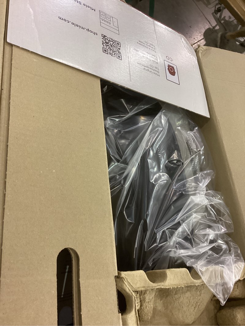 Condition photo showing As Is for Miele New Guard M1 Cat & Dog Bagged Canister Vacuum for Pet Owners with Odor-Reducing Active AirClean Filter, TurboTeQ Floorhead, and AllTeQ Universal Floorhead, in Obsidian Black/Space Grey Miele Guard M1 Obsidian Black/Space Grey