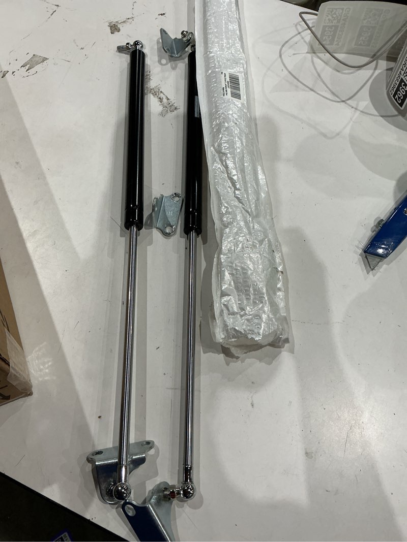 Condition photo showing As Is for 23 inch 200lb/890n gas shock strut spring lift support for heavy lid hrdraulic murphy rv bed box cellar door floor hatch