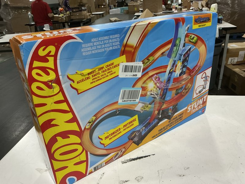 Condition photo showing New/Like New for hot wheels sky crash tower track set, 2.5+ ft / 83 cm high with motorized booster, orange track & 1 hot wheels vehicle, race multiple cars, gift for kids 5 to 10 years old & up standard