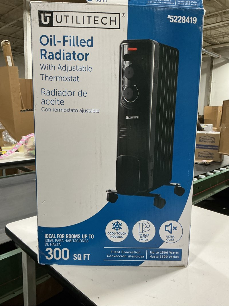 Condition photo showing As Is for Utilitech 1500 -Watt Oil-filled radiant Utility Indoor Electric Space Heater with Thermostat