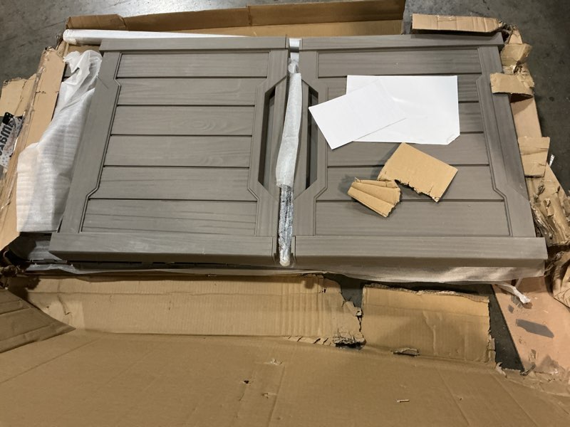 Condition photo showing As Is for yitahome 120 gallon outdoor storage box with cushion in a patio 