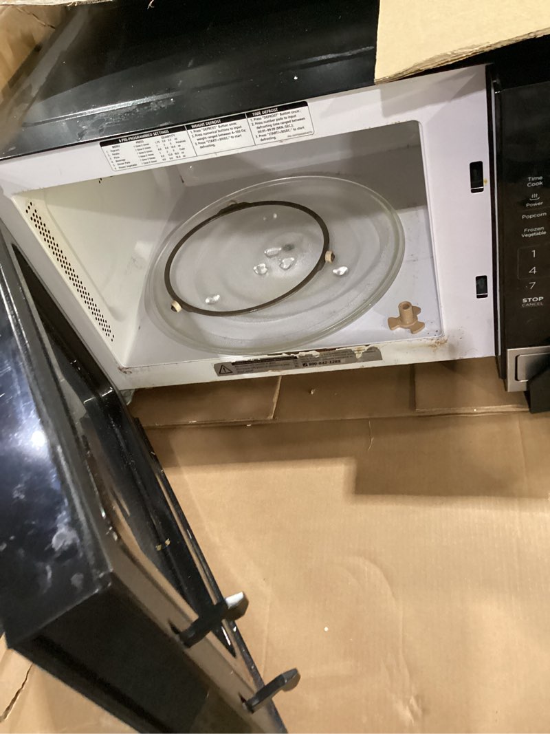 Condition photo showing Good Condition for *used/not tested*black+decker digital microwave oven with turntable push-button door, child safety lock, stainless steel, 0.9 cu ft 0.9 cu.ft stainless steel