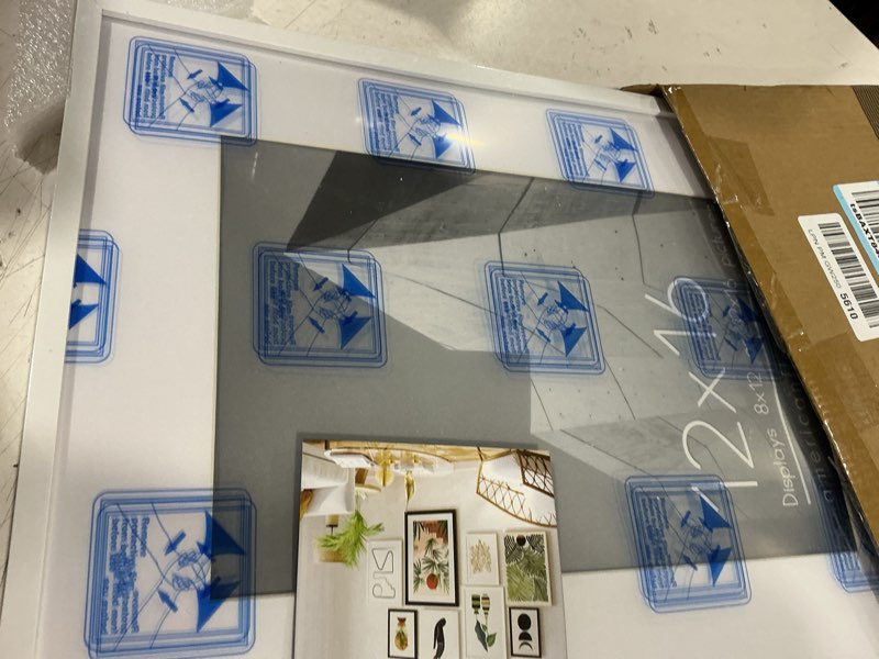 Condition photo showing Good Condition for americanflat 12x16 picture frame with polished plexiglass - use as 8x12 frame with mat or display 12x16 photo without mat - streamline collection - thin border picture frames for wall - white white 12x16 1 pack