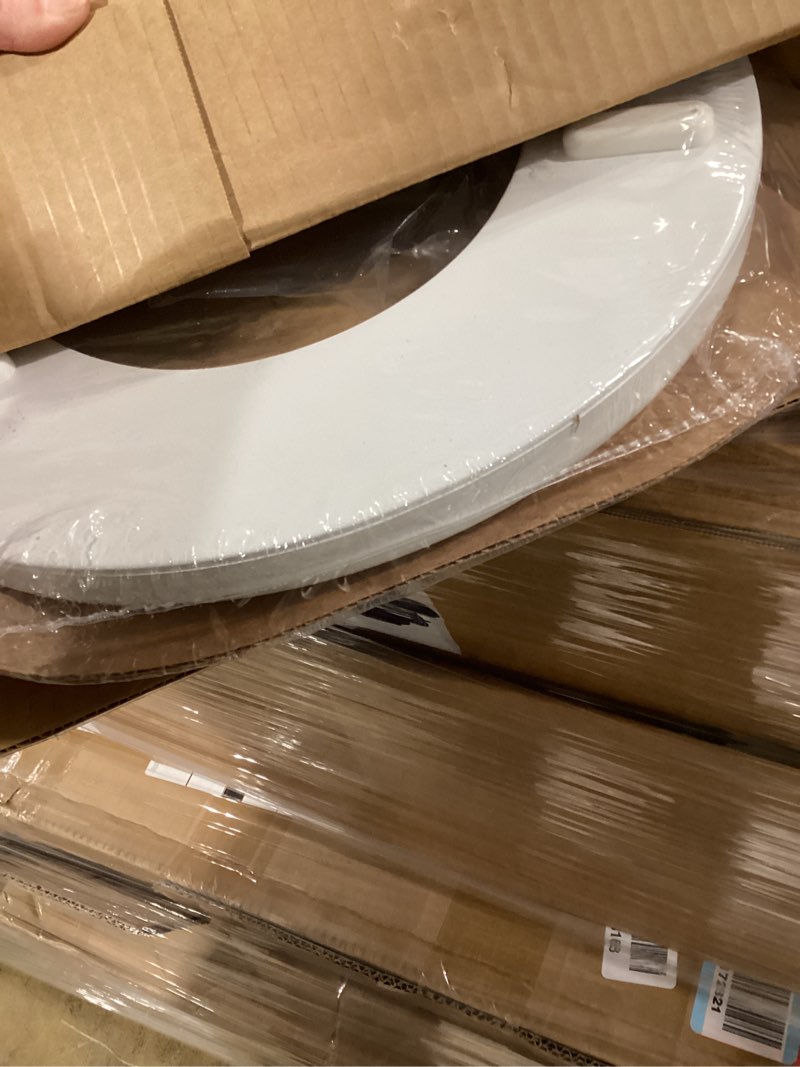 Condition photo showing New/Like New for Mayfair Padded Toilet Seat with Chrome Hinges, Soft Vinyl over Wood Core Seat, Made in USA, Round, White Elongated Seat