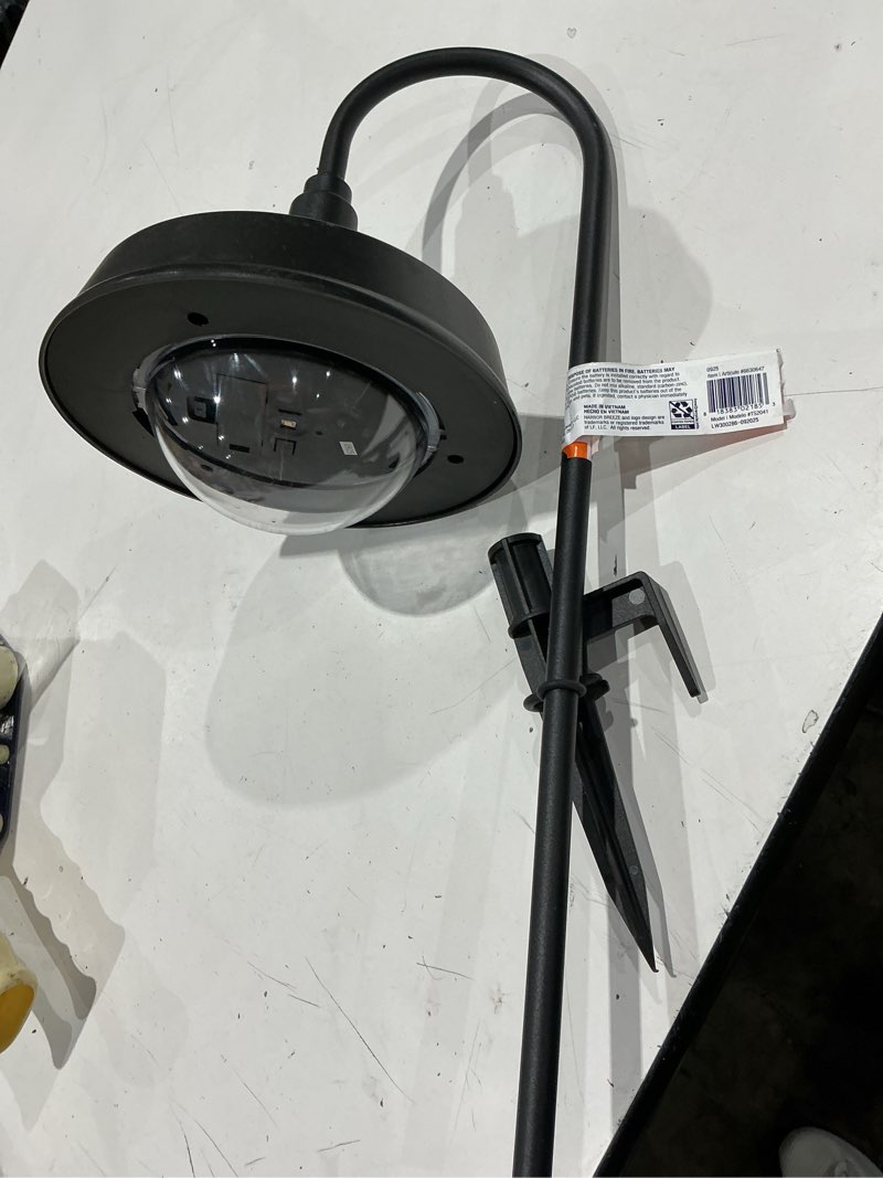Condition photo showing As Is for harbor breeze solar path light 20 -lumens black solar led outdoor path light