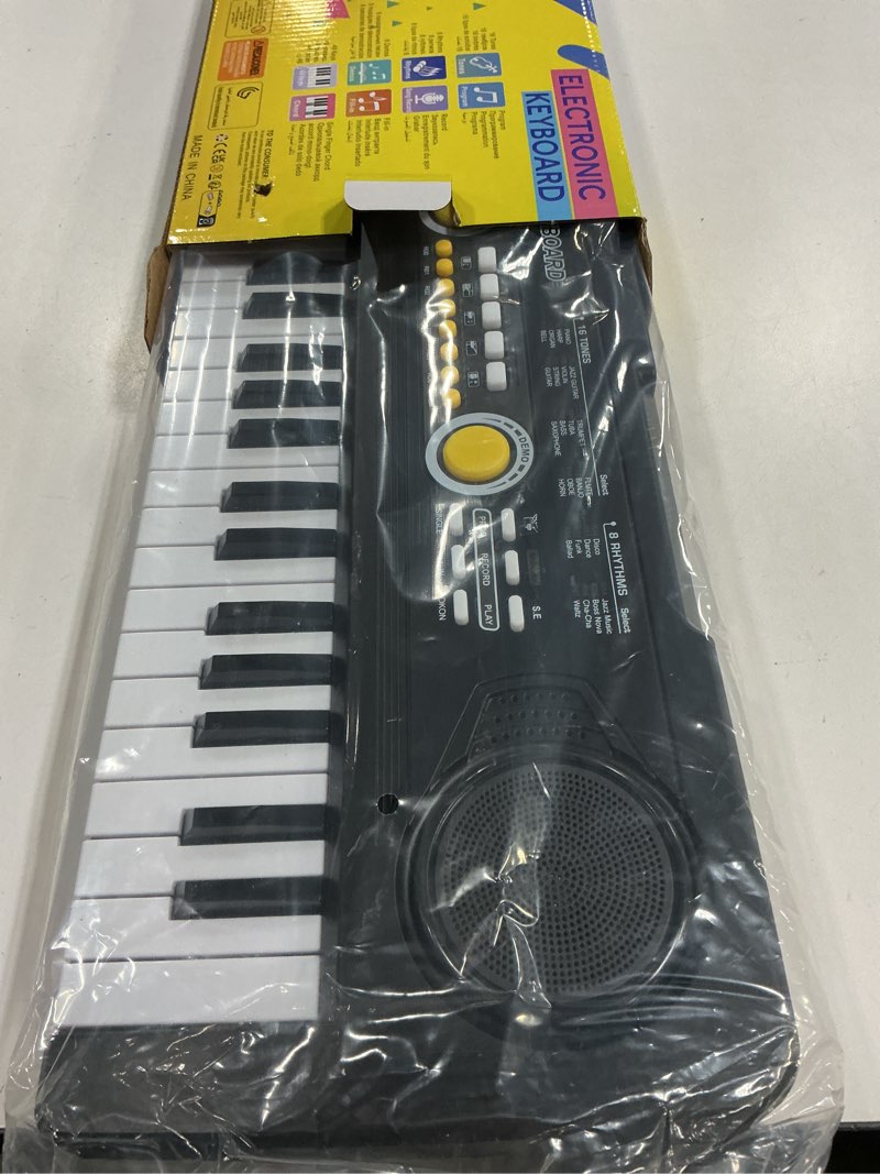 Condition photo showing New/Like New for Kids Piano Keyboard with Microphone, 49 Keys Portable Electronic Piano Keyboard for Kids Beginners Ages 3 4 5 6 7, Toy Music Keyboard Birthday Xmas Gift for Girls Boys, Black