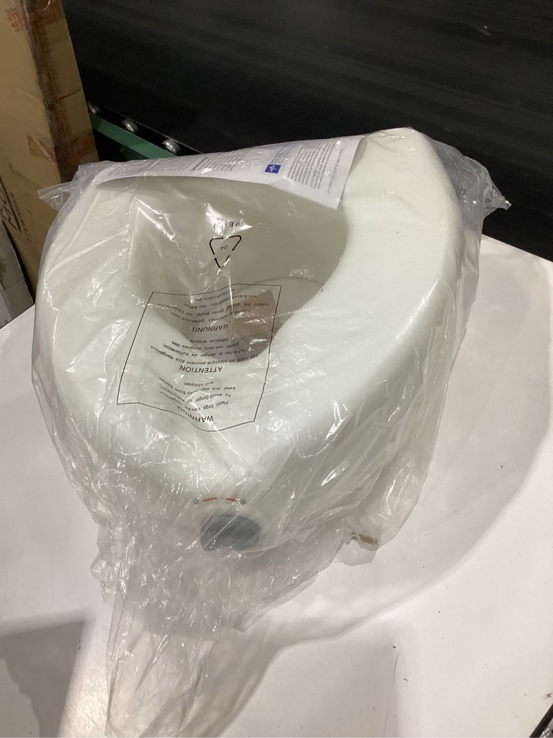 Condition photo showing New/Like New for medline 5" raised toilet seat with lock, no arms, white, 400 lb capacity - easy installation - elderly & disabled bathroom aid