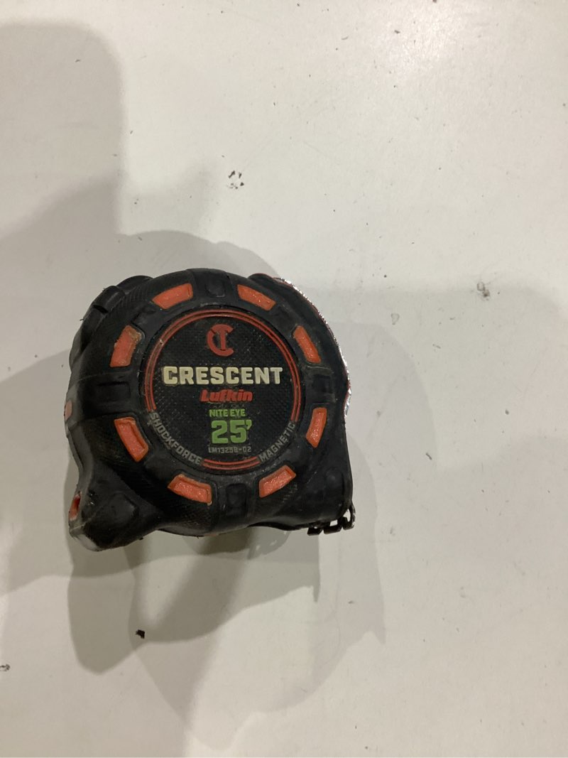 Condition photo showing As Is for crescent lufkin orange shockforce nite eye 25-ft magnetic tape measure