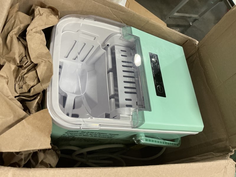 Condition photo showing Good Condition for dumos countertop ice maker with handle, 26lbs/24h portable ice machine, 9 bullet cubes ready in 6 mins, self-cleaning, quiet compact for home, kitchen, rv, camping, green green handle-26.5lbs/24h