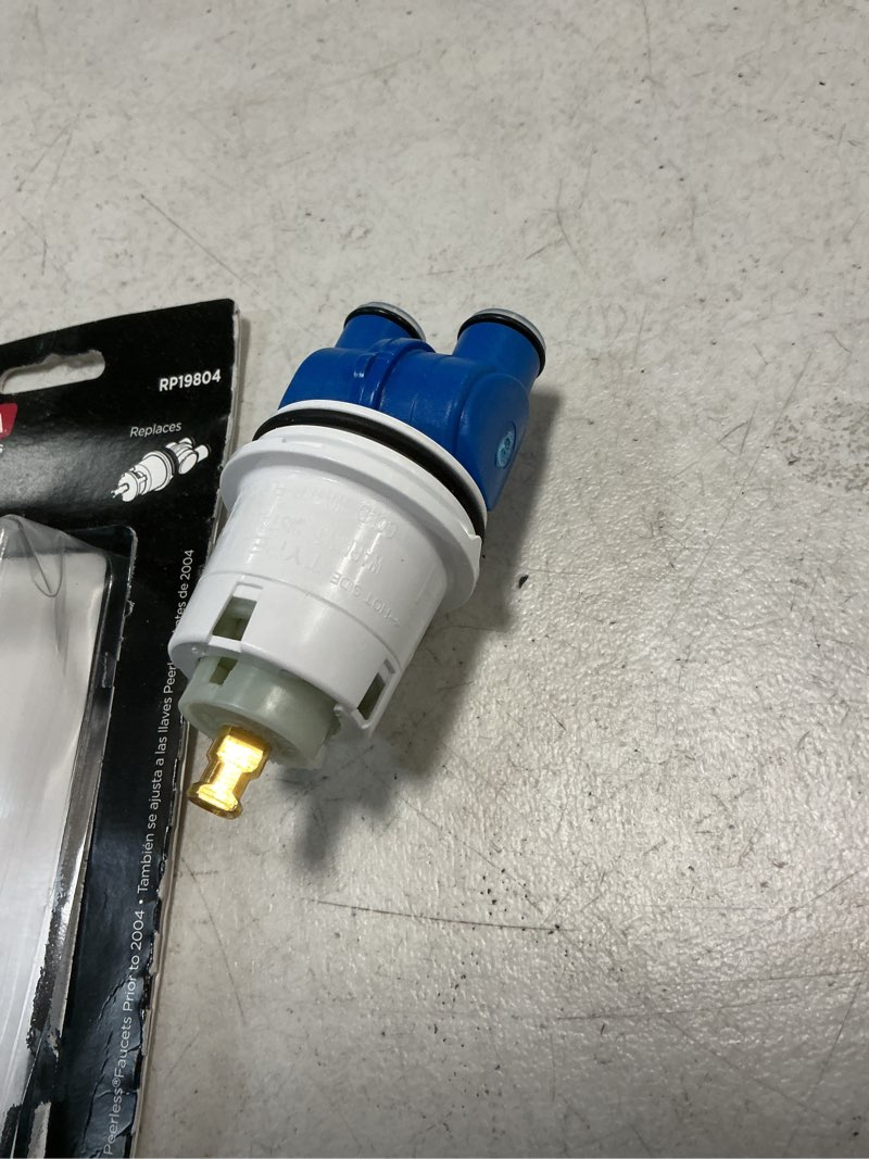 Condition photo showing Good Condition for delta faucet rp19804 1300/1400 series catridge assembly small