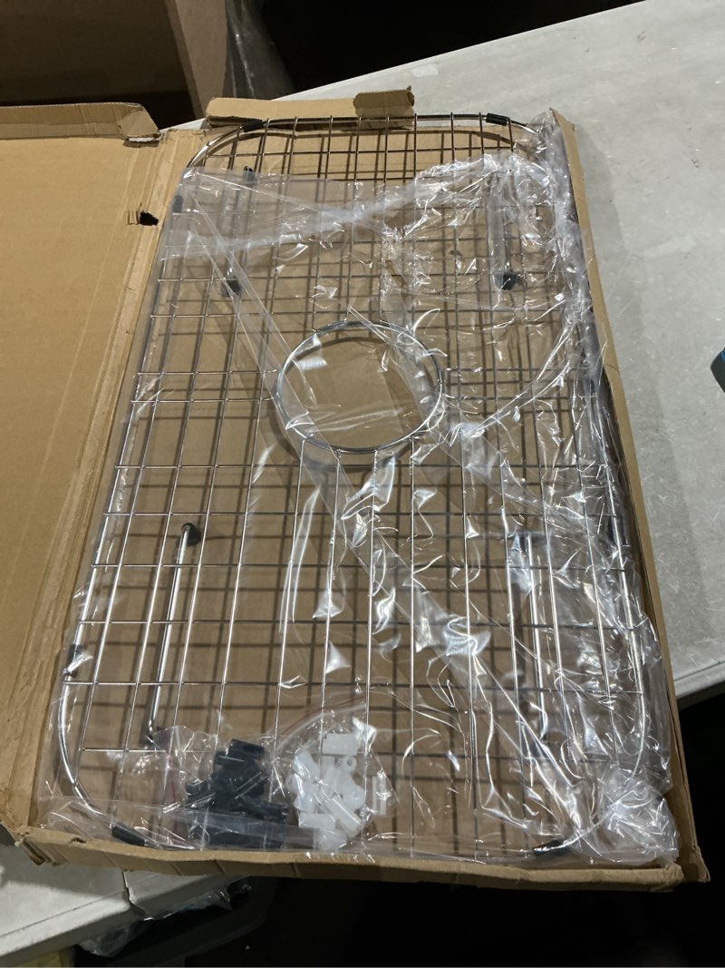 Condition photo showing Good Condition for sink protector grid 26-1/16" x 14-1/16", centered drain with corner radius 3-1/2", 304 stainless steel material (centered drain) for single bowl kitchen sink 26-1/16" x 14-1/16" centered drain