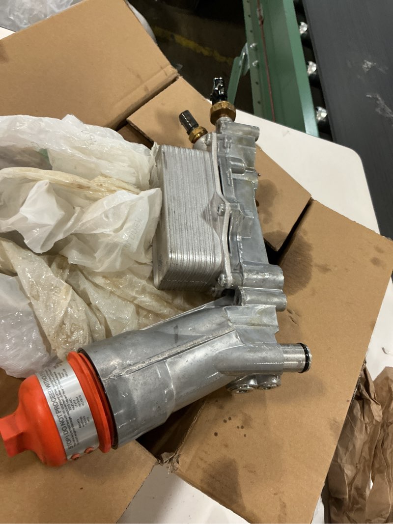 Condition photo showing As Is for 926-959 Aluminum Engine Oil Filter Housing For 11-16 Dodge Chrysler Ram Jeep 3.6 ( similar 