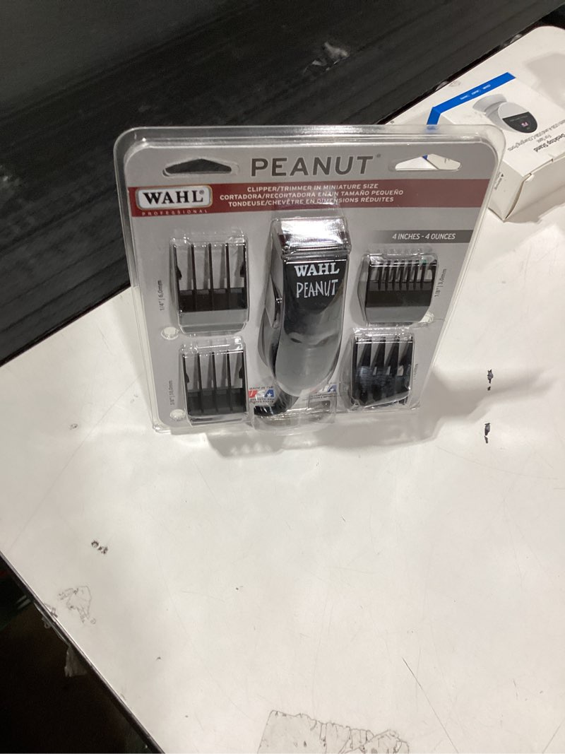 Condition photo showing New/Like New for Wahl Professional Peanut Corded Trimmer - Compact, Lightweight Powerful Rotary Motor Grooming Tool, with 4 Trimming Guides and Accessories Black