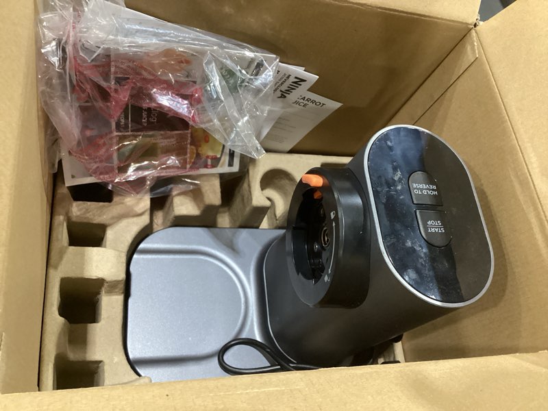 Condition photo showing As Is for ninja neverclog cold press juicer, powerful slow juicer with total pulp control, countertop, electric, 2 pulp functions, dishwasher safe, 2nd generation, charcoal, jc151, not tested, missing parts