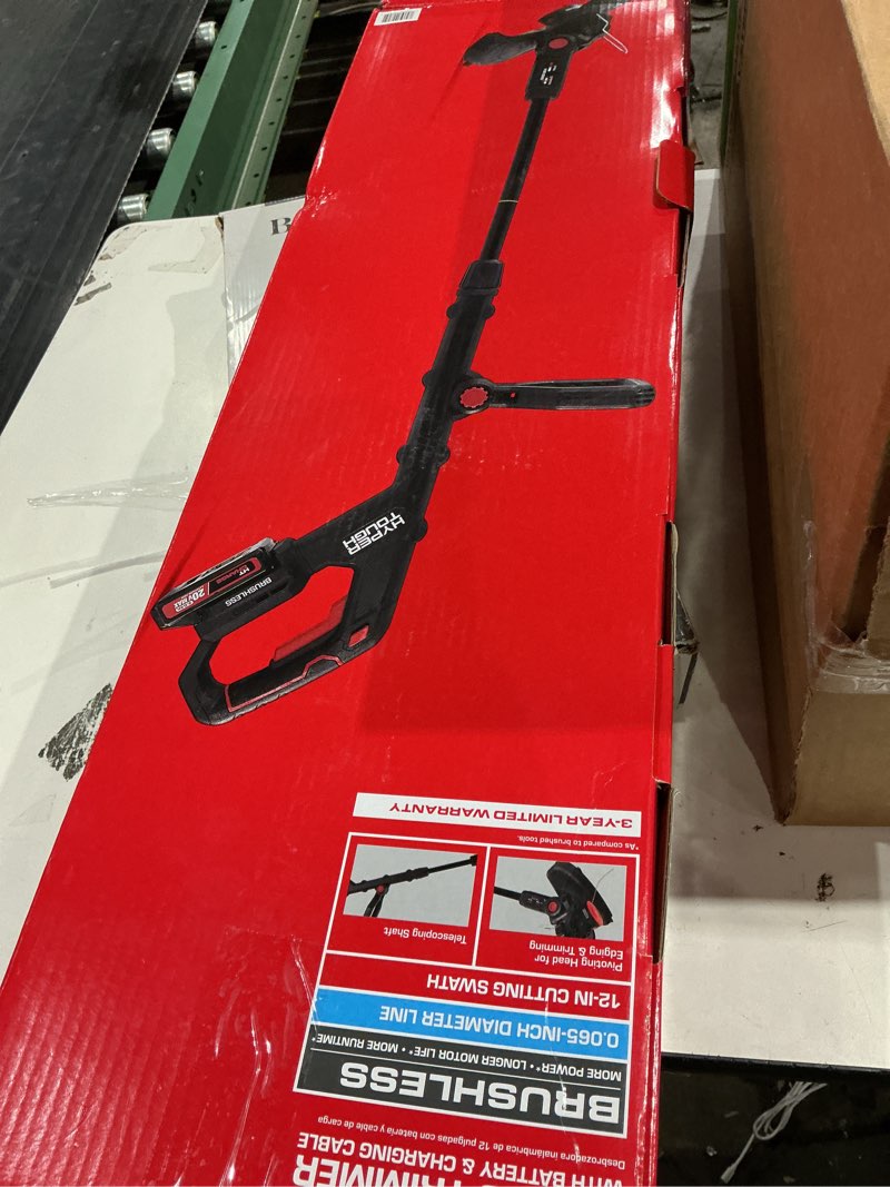 Condition photo showing As Is for hyper tough 12" 20v brushless cordless string trimmer with 20v max 2.0ah battery and charging cable