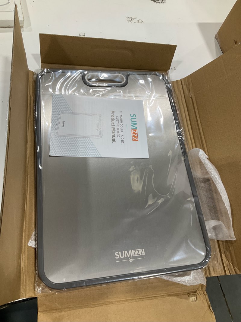 Condition photo showing Good Condition for titanium cutting board for kitchen, double sided chopping board, 99.9% pure titanium & pp, non-porous, odor resistant, safe for raw & cooked food, easy to clean, large 15”×10.3” silver set of 1 (16" x 11")