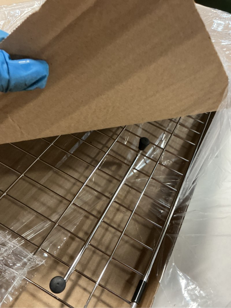 Condition photo showing Good Condition for stainless steel sink grid and protectors for bottom of kitchen sink, 26" x 14 1/16" sink bottom grid with rear drain for single sink bowl (26" x 14 1/16") 26" x 14 1/16" rear drain