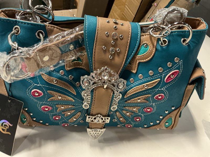 Condition photo showing New/Like New for trendy cowgirl-style women's handbag