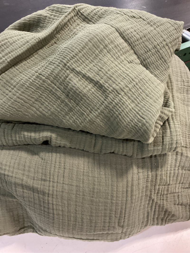 Condition photo showing As Is for quince organic cotton gauze dream quilt set olive queen