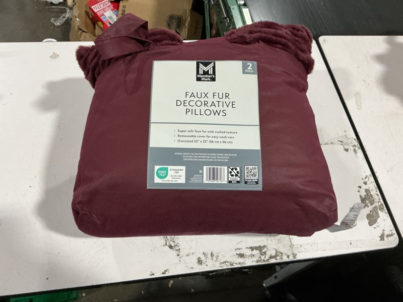 Condition photo showing New/Like New for member's mark 2-pack ruched faux fur decorative pillows, 22" x 22"
