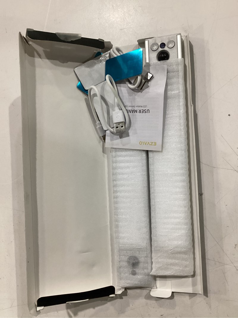 Condition photo showing Good Condition for ezvalo 10inch under cabinet lighting, rechargeable motion sensor light indoor with 3 color temperatures, dimmable & magnetic closet lights, wireless under counter lights for kitchen, stairs (2 pack) 3 color light 10inch