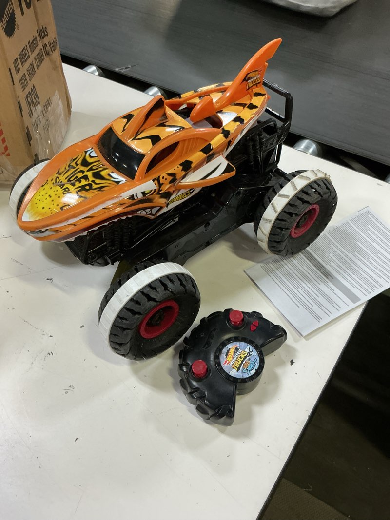 Condition photo showing As Is for hot wheels monster trucks rc, 1:24 scale tiger shark vehicle, oversized remote-control toy truck with terrain action tires