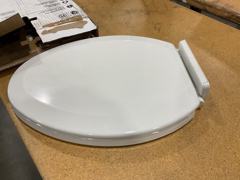 Condition photo showing As Is for kohler 4636-rl-0 cachet readylatch elongated slow close toilet seat, soft close toilet seat quiet lid, contoured grip-tight bumpers installation hardware, apartment essentials, white white elongated ready latch