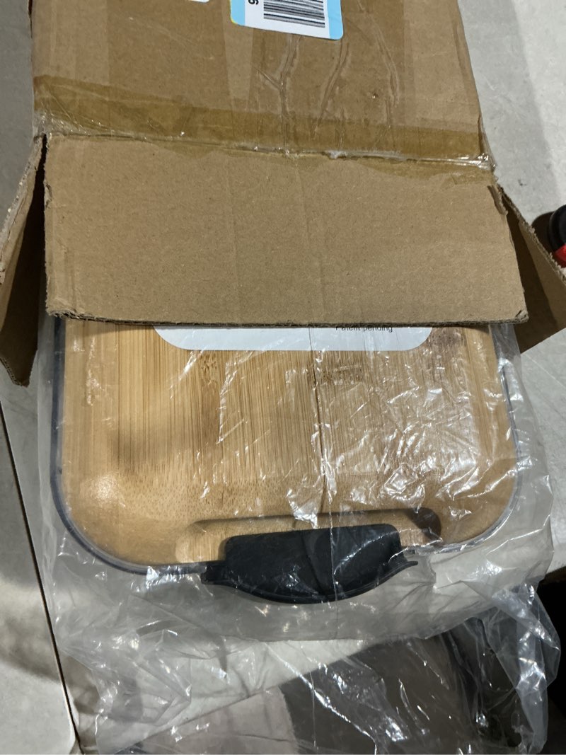Condition photo showing Good Condition for FARBERWARE Rectangular Build-a-Board Cutting Board with Single Compartment and Clear Locking Lid for Charcuterie, Snacks, and More, Bamboo Black/Bamboo 1 Compartment