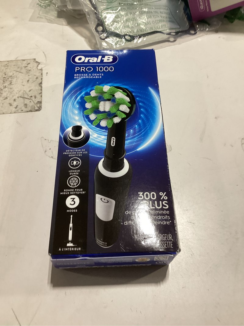 Condition photo showing New/Like New for Oral-B Pro 1000 Rechargeable Electric Toothbrush, Black