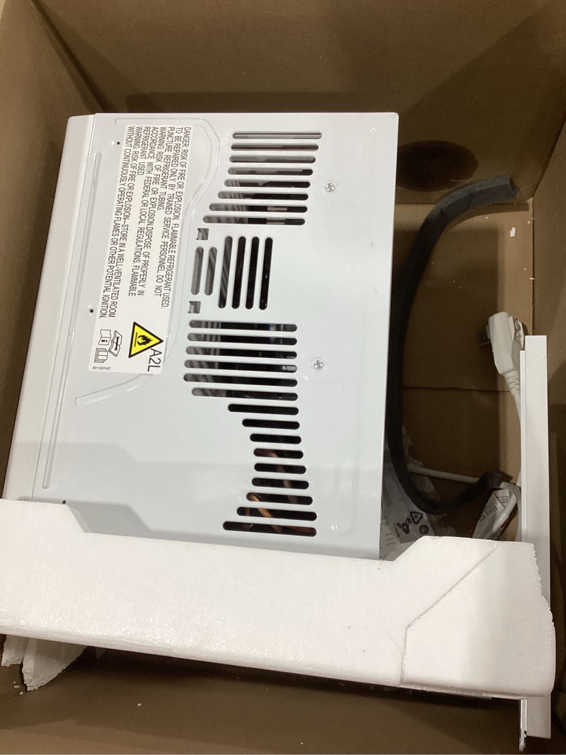 Condition photo showing Good Condition for ge window air conditioner unit, 5,000 btu for small rooms up to 150 sq ft. with manual adjustable fan and cooling settings, perfect for small bedroom or living room, easy install kit included, white new 5,000 btu mechanical controls white