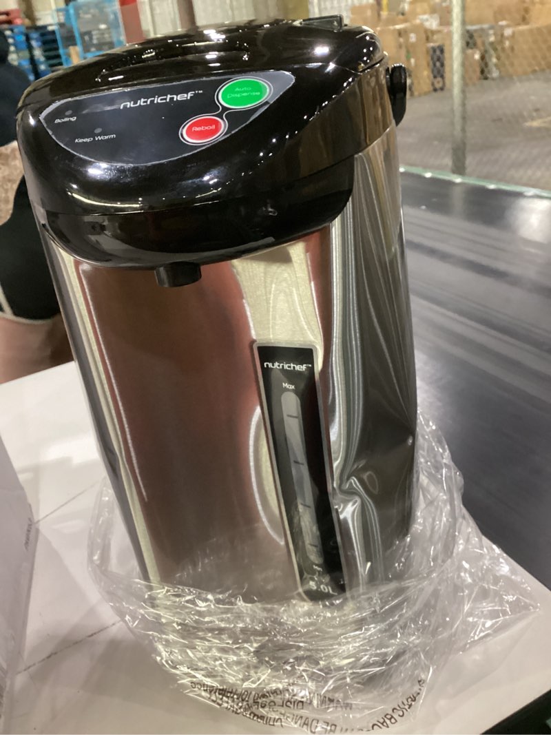 Condition photo showing As Is for nutrichef 5.2 qt electric water kettle, portable, quick heating, 5 liter digital kettle with 5 temperature settings, safety lock, stainless steel, 3 dispensing options, 8.46" x 11.2" x 16.5" 5.3 quarts