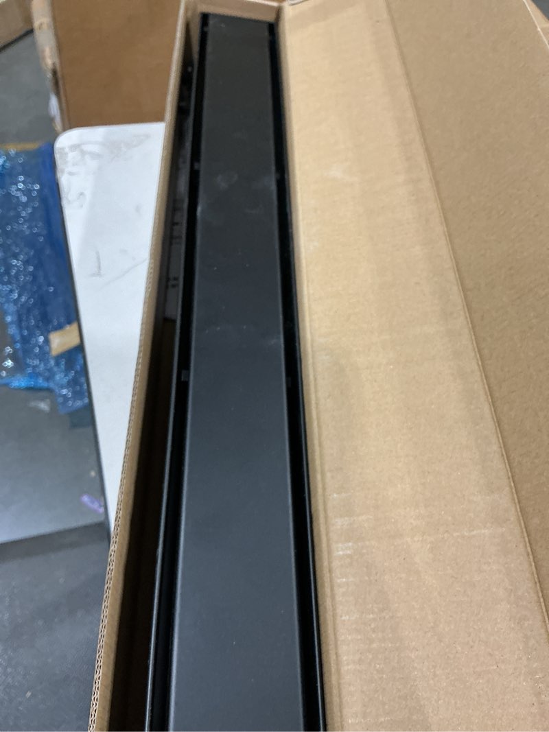 Condition photo showing As Is for baronage 24 inch linear shower drain, rectangle shower floor drain reversible 2-in-1 tile insert cover, 304 stainless steel bathroom drains with hair catcher and leveling feet (matte black) matte black 24 inch