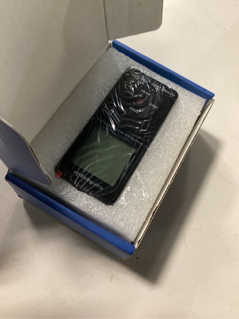 Condition photo showing Good Condition for mini aviation band radio built in 400mah lithium battery, fm am air radio with earphone, orange backlight lcd dispaly, support automatic storage and search
