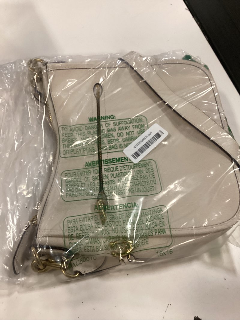 Condition photo showing Good Condition for coach women's polished pebble leather chaise crossbody one size chalk