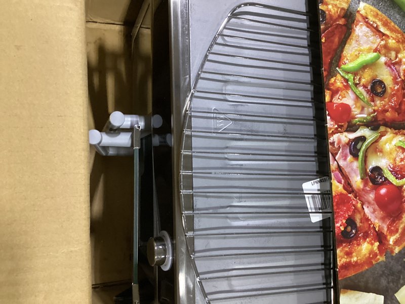 Condition photo showing Good Condition for black+decker crisp 'n bake air fryer toaster oven combo, 12 in 1 countertop convection oven cooks food fast, fits a whole pizza or 6 toast slices, french doors with stainless steel finish