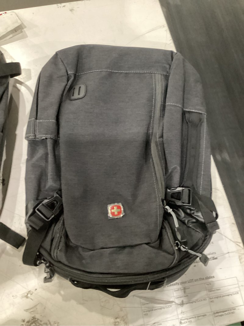 Condition photo showing Good Condition for swissgear weekender backpack, grey color, fits most 15" laptop computers