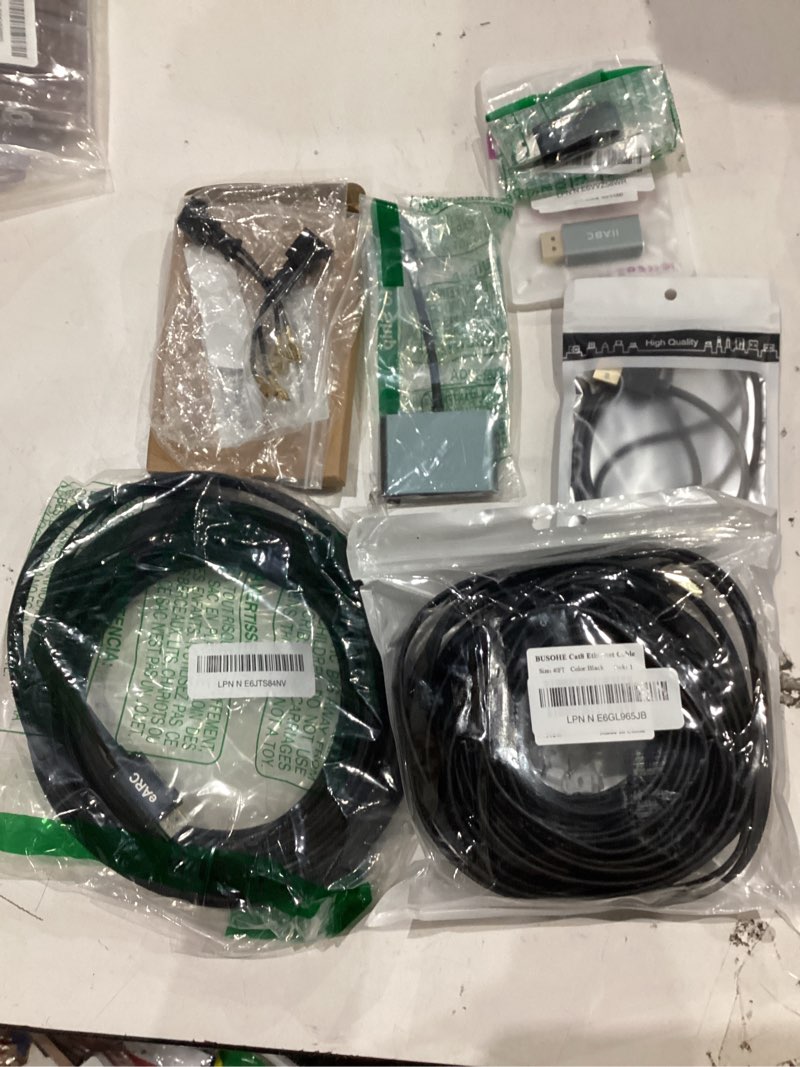Condition photo showing As Is for assorted lot of electronics (headphones, small gadgets, headsets, etc.) 
