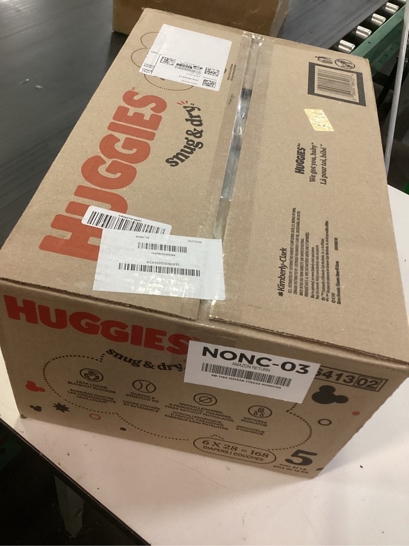Condition photo showing New/Like New for huggies snug & dry diapers - size 5 - 168ct