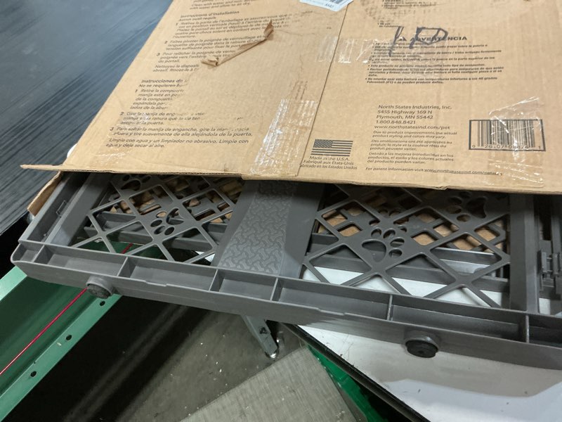 Condition photo showing Good Condition for mypet north states paws portable pet gate: 26-40" wide. pressure mount. no tools needed. made in usa, 23" tall, expandable, durable dog gates for doorways, fieldstone gray