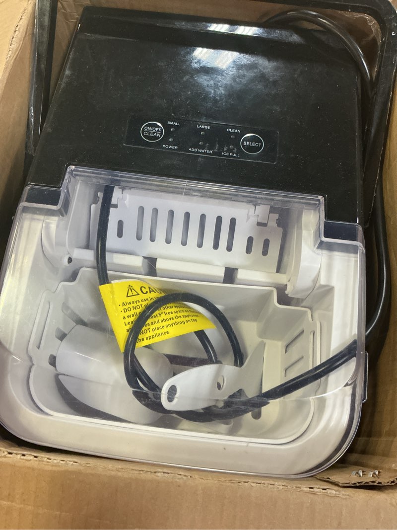 Condition photo showing As Is for dumos countertop ice maker with handle, 26lbs/24h portable ice machine, 9 bullet cubes ready in 6 mins, self-cleaning, quiet compact for home, kitchen, rv, camping, bright black bright black handle-26.5lbs/24h