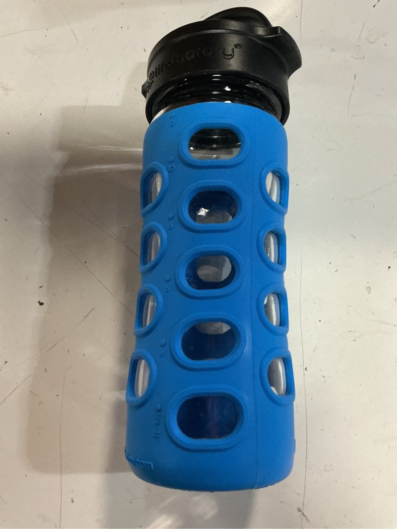 Condition photo showing Good Condition for lifefactory 12-ounce bpa-free glass water bottle with classic cap and protective silicone sleeve, cobalt blue | protective silicone sleeve, chug cap, carry handle, bpa free, reusable, dishwasher safe 12 ounces cobalt blue