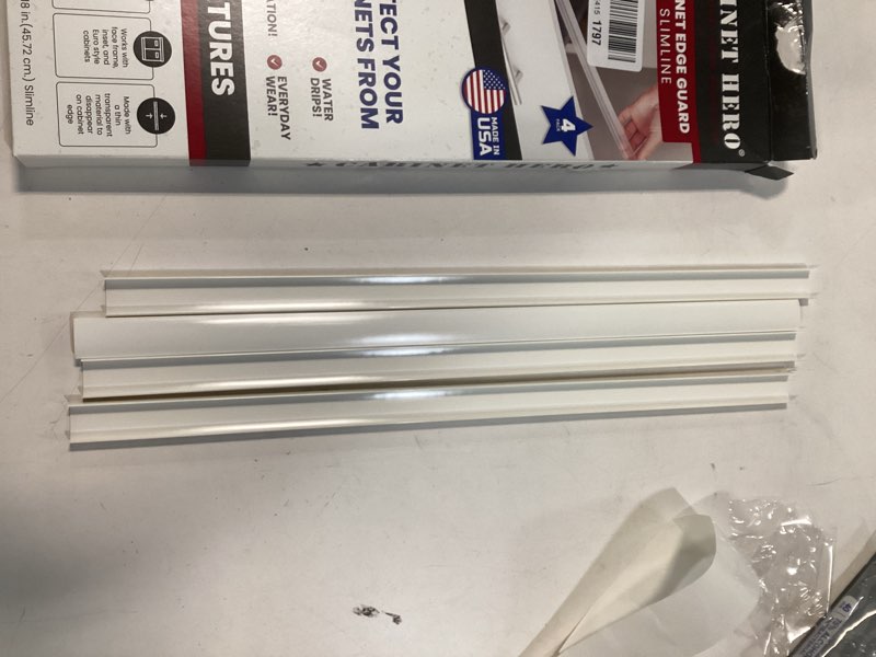 Condition photo showing Good Condition for Cabinet Hero Slimline Cabinet Edge Protector - Prevents Chipping, Wear, Discoloration - Drawer Edge Guard, Bumper for Drawer - Easy Slip-On Installation - 3/4" Thick, 18" Length, White Pack of 4 18" Length x 3/4" Door Thickness (Pack of 4) White